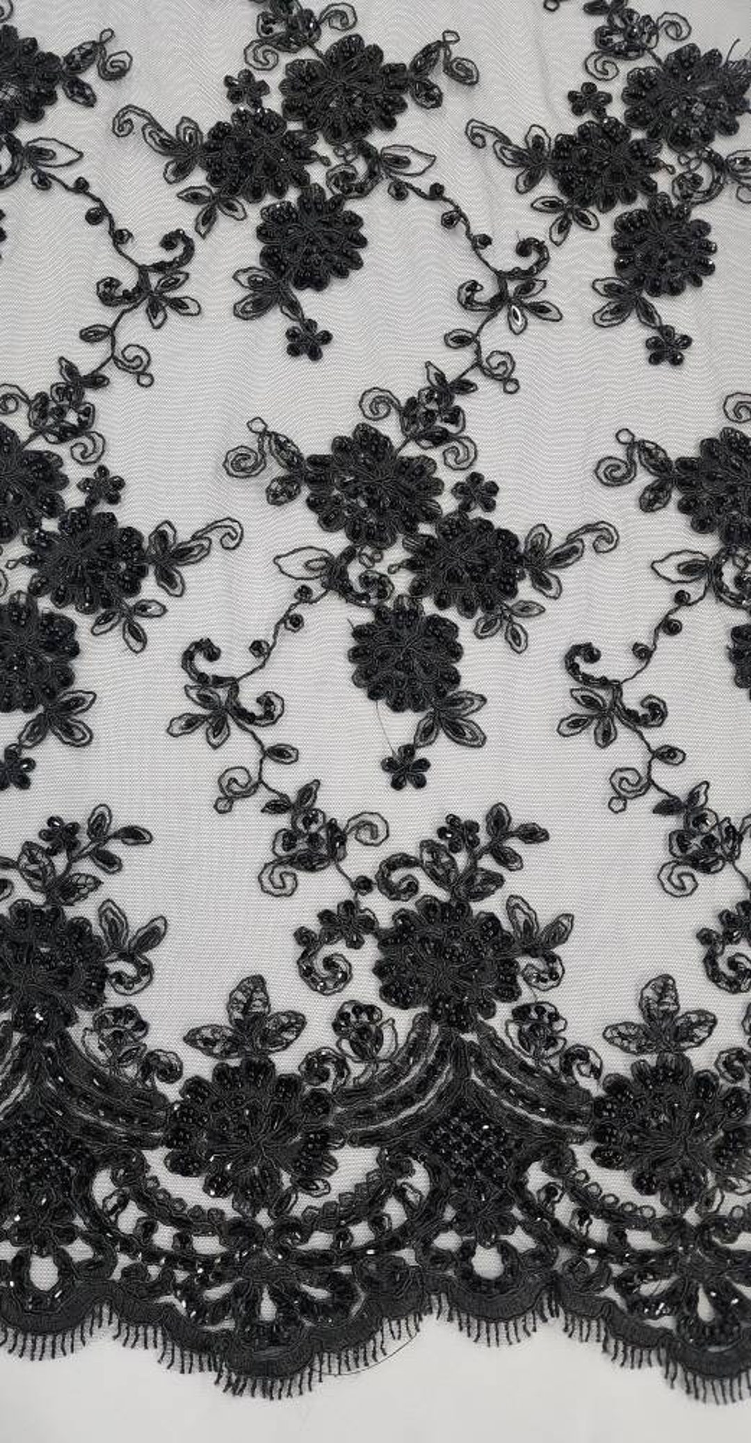 BLACK DIVA DESIGN EMBROIDERY WITH HEAVY BEADED ON A MESH-SOLD BY YARD. main image 1