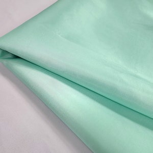 thumbnail interactive-video image 1 of Taffeta Solid Fabric – Sage Green – 58" Wide – Sold By The Yard 1 of 3