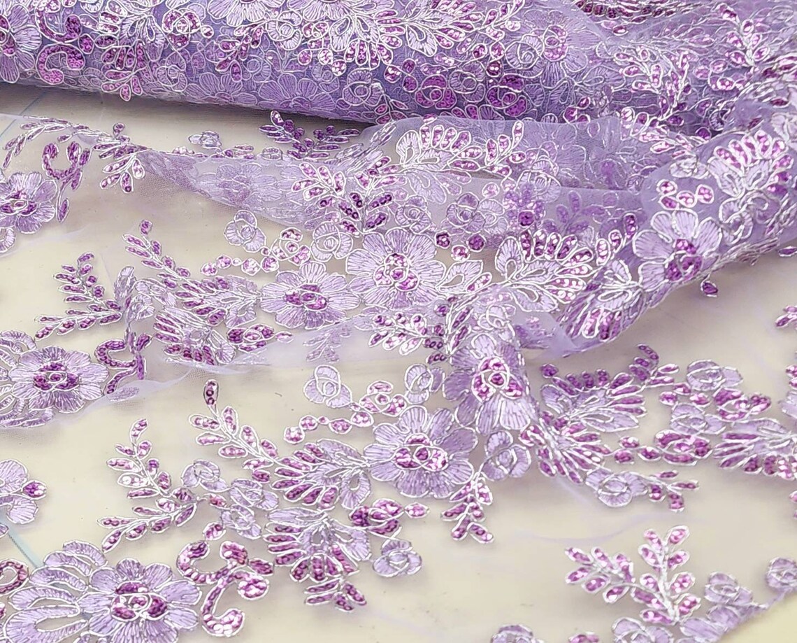 DARK LILAC FLORAL DESIGN WITH CORD EMBROIDERY ON A MESH LACE-SOLD BY YARD. main image 1