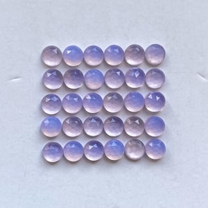 Lote com 30 pedras preciosas de quartzo lavanda lapidadas em rosa para confecção de joias.