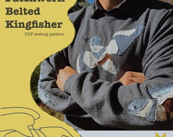 May include: A gray sweatshirt with a patchwork kingfisher design. The bird is made of blue, white, and brown fabric. The text "beginner friendly Patchwork Belted Kingfisher PDF sewing pattern" is on the left side. The brand name "biscuits n' gracie art studio" is at the bottom.