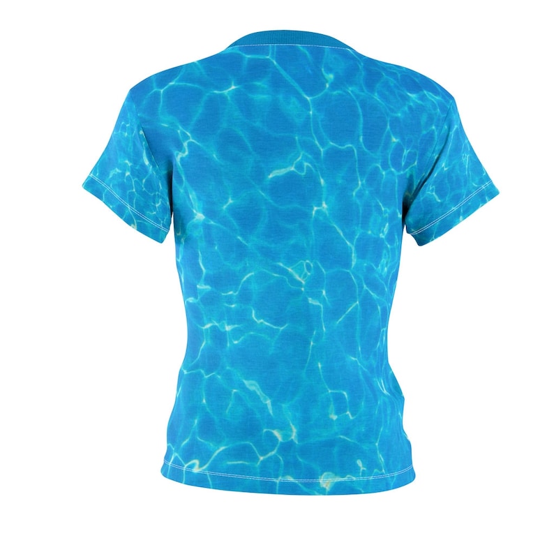 May include: A blue t-shirt with a water ripple pattern.