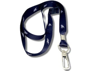 May include: A black lanyard with a silver swivel clip. The lanyard has white text that says "FKA" repeated on it.