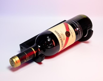 Soporte de pared para botellas de vino impreso en 3D: elegante soporte para botellas de vino para una presentación elegante y un almacenamiento seguro de sus vinos.