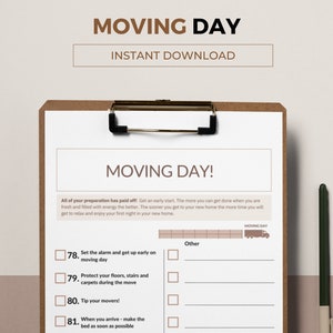 May include: A checklist on a clipboard with the title "Moving Day!" and a list of tasks to complete on moving day, such as setting an alarm, protecting floors, tipping movers, and making the bed.