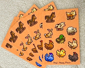 May include: A stack of orange-toned cards featuring pixelated farm animals. The cards display images of horses, rabbits, chickens, ducks, cows, sheep, and goats. The text "Meg's Hoppy Place" is visible on one card.