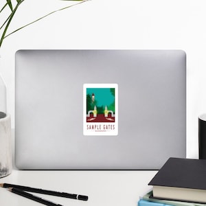May include: A sticker featuring a colorful illustration of a gate with the text "SAMPLE GATES" below it.