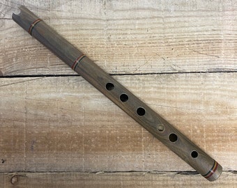 Wooden Andean Quena Jacaranda flute with a decorated protective carry bag