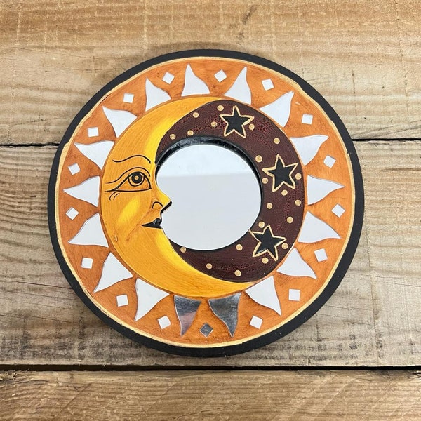 WOODEN MIRROR with Crescent -Shaped MOON surrounded by sunrays that are inlaid in glittering silver.