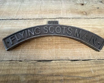 Curved cast iron Flying Scotsman wall mounting plaque -