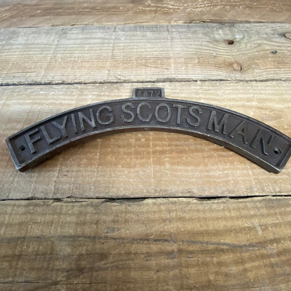 Curved cast iron Flying Scotsman wall mounting plaque -