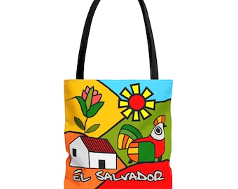 May include: A colorful tote bag with a design featuring a house, a flower, a sun, and a rooster. The text "El Salvador" is printed on the bottom of the bag.