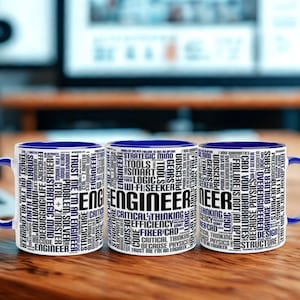 May include: Three white ceramic mugs with blue interiors and handles are displayed on a wooden surface. Each mug features the word "ENGINEER" in large, bold letters, surrounded by a collage of engineering-related terms in black and white.