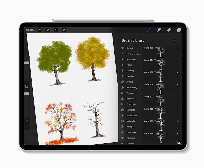 May include: Digital art on a tablet featuring four tree illustrations in various stages of the seasons. The tablet's screen displays a "Brush Library" with different artistic tools. A stylus rests on the top edge.