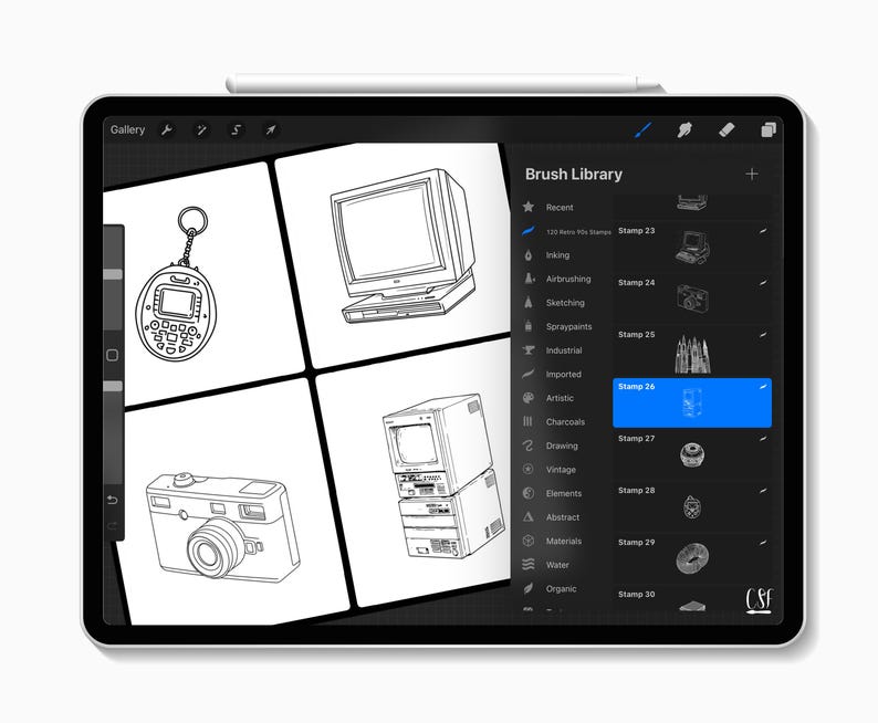 May include: A digital art tablet displaying a black and white illustration of retro tech items, including a camera, computer, and Tamagotchi. The screen shows a "Brush Library" menu with various stamp options.