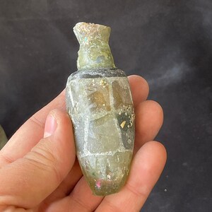 Beautiful Ancient Roman irdescent glass  bottle in good condition