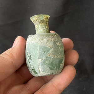Wonderful Ancient Roman irdescent glass bottle in good condition