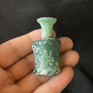 Wonderful ancient Roman irdescent glass unique small bottle with lovely Patina