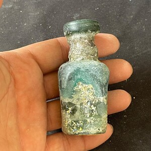 Wonderful Ancient Roman irdescent glass  bottle in good condition