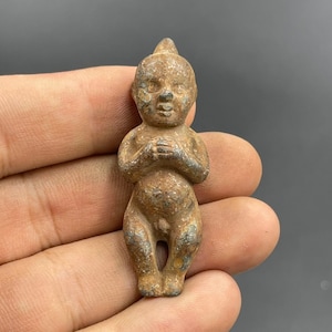 Near Eastern old Bronze small baby statue with Rarepatina