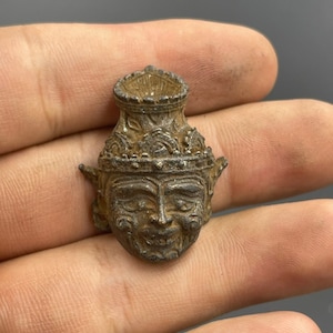 Ancient near Eastern bronze face engraved amulet pendant