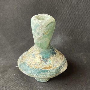 Beautiful Ancient Roman irdescent glass bottle in good condition