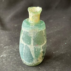 Wonderful Ancient Roman irdescent glass  bottle in good condition
