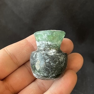 Beautiful ancient Roman irdescent glass unique small bottle with lovely Patina