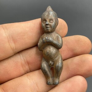 Near Eastern old Bronze small baby statue