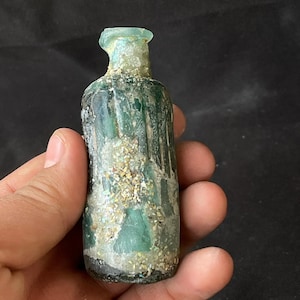 Wonderful Ancient Roman irdescent glass bottle in good condition