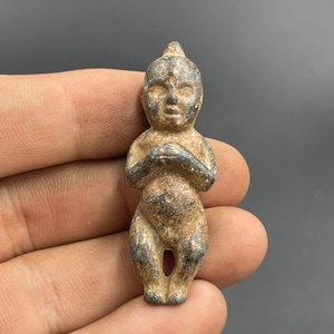 Near Eastern old Bronze small baby statue