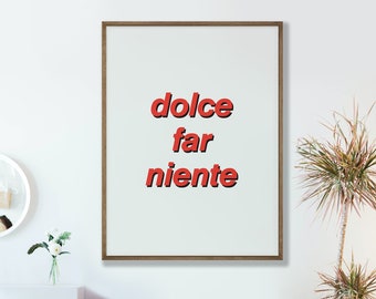 May include: A framed print with the text "dolce far niente" in red lettering on a white background.