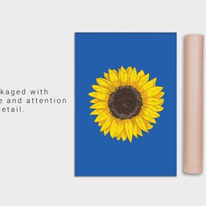 May include: A bright yellow sunflower with a dark brown center is drawn on a blue background. The image is printed on a poster.