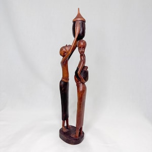 Vintage wood African family figurine Hand carved man and pregnant woman with little baby sculpture