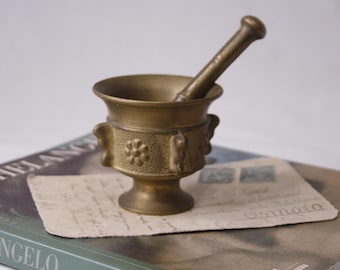 Vintage small brass mortar and pestle with faces and flowers decor Antique apothecary heavy mortar and pestle