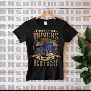 May include: Black t-shirt with a graphic of a blue semi-truck and the text "The Best Truck Drivers Live in Kentucky".