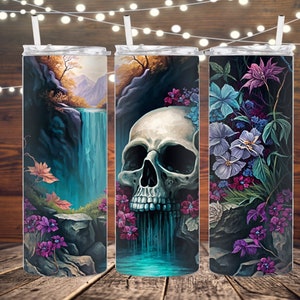 May include: Three stainless steel tumblers with different designs. The first tumbler features a waterfall in a forest setting. The second tumbler features a skull with a waterfall flowing from its mouth. The third tumbler features a floral design with purple, blue, and green flowers.