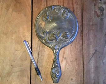 Art Nouveau pewter hand mirror, round, handle, flowers,