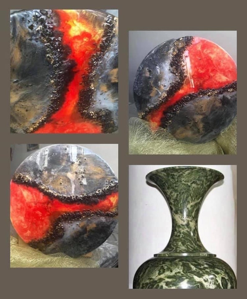 May include: Two round resin art pieces with black, white, and red abstract designs. The resin is clear and has a glossy finish. The pieces are set on a white background. A green marble vase with a flared top is also shown.