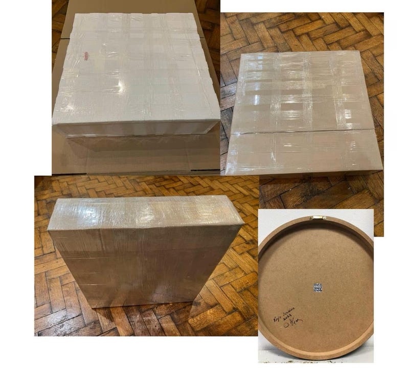 May include: Three cardboard boxes wrapped in brown packing tape. The boxes are different sizes and shapes. One box has a round wooden top with a handwritten label that says "Lego Room 2023"