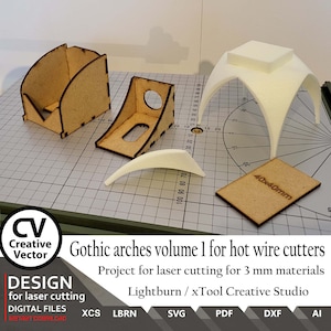 May include: A set of laser cut wooden arches for hot wire cutters. The set includes a variety of arch shapes and sizes, as well as a base for the arches to stand on. The arches are designed to be used with hot wire cutters to create custom shapes and designs. The image also includes the text "Gothic arches volume 1 for hot wire cutters" and "Project for laser cutting for 3 mm materials".