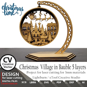 May include: A laser cut wooden Christmas village ornament in the shape of a bauble with a stand. The ornament features a winter village scene with houses, trees, and a Santa Claus flying in a sleigh with reindeer. The ornament is made for 3mm materials and is designed for use with Lightburn or xTool Creative Studio software. The ornament is available in XCS, LBRN, SVG, PDF, DXF, and AI file formats.