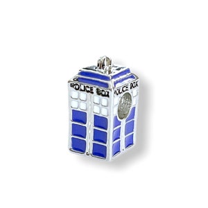 May include: A silver charm shaped like a blue police box with the words "Police Box" on the side. The charm has a hole in the top for attaching to a bracelet.