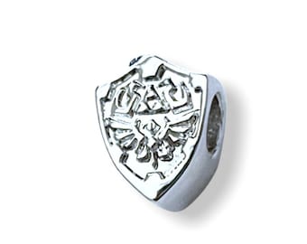 Amuleto de escudo de jugador de la Trifuerza