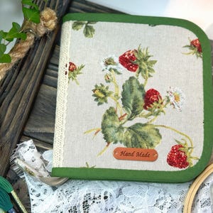 Compact organizer for storing sewing accessories or a small embroidery project, zippered case for storing needles and other sewing tools
