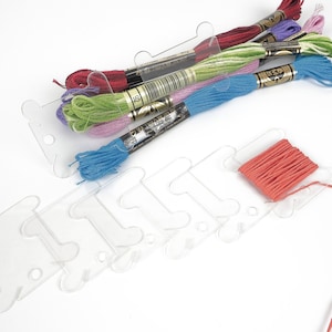 Set of 100+ transparent plastic bobbins. Clear PE 0.4 мм (400 µm)