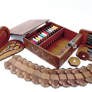 Embroidery Set Eastern ornament. 24 bobbins for thread. An openwork box. Needle magnets. + Scissor case. +Needle Holder. Personalized box
