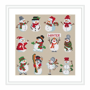 May include: A framed cross-stitch featuring twelve snowmen in various poses. Each snowman has a unique hat, scarf, and accessories. One snowman holds a sign that reads "WINTER". The snowmen are set against a beige background.