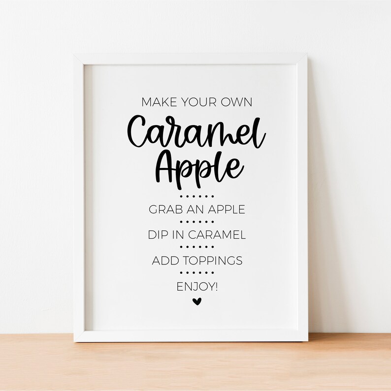 Make Your Own Caramel Apple sign. Instructions include: Grab an apple, Dip in caramel, Add toppings, Enjoy! Modern minimalist design. A line of 6 black dots separate each instruction. Small black heart at the bottom.