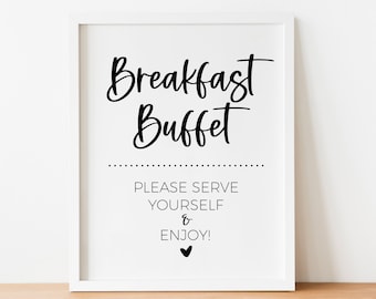 May include: A white framed sign with black text that reads "Breakfast Buffet" and "Please serve yourself & enjoy!" with a small black heart at the bottom.